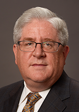 Gary Ellis | Retired, Executive Vice President, Global Operations, Information Technology and Facilities & Real Estate